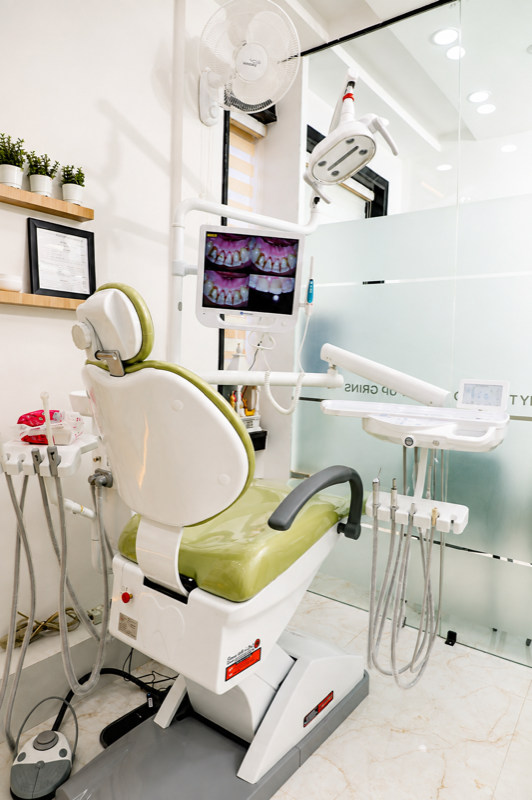 Modern dental chair with intraoral camera monitor setup