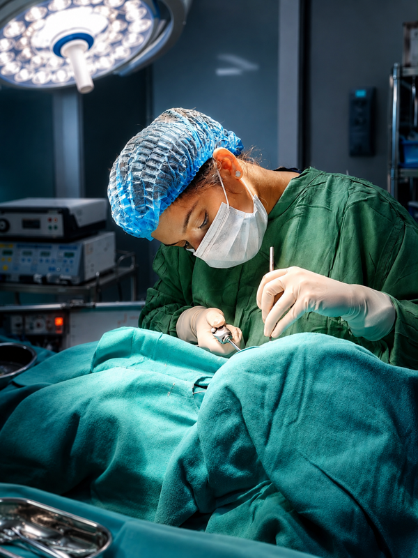 Dentist providing focused treatment care in a clinical operatory